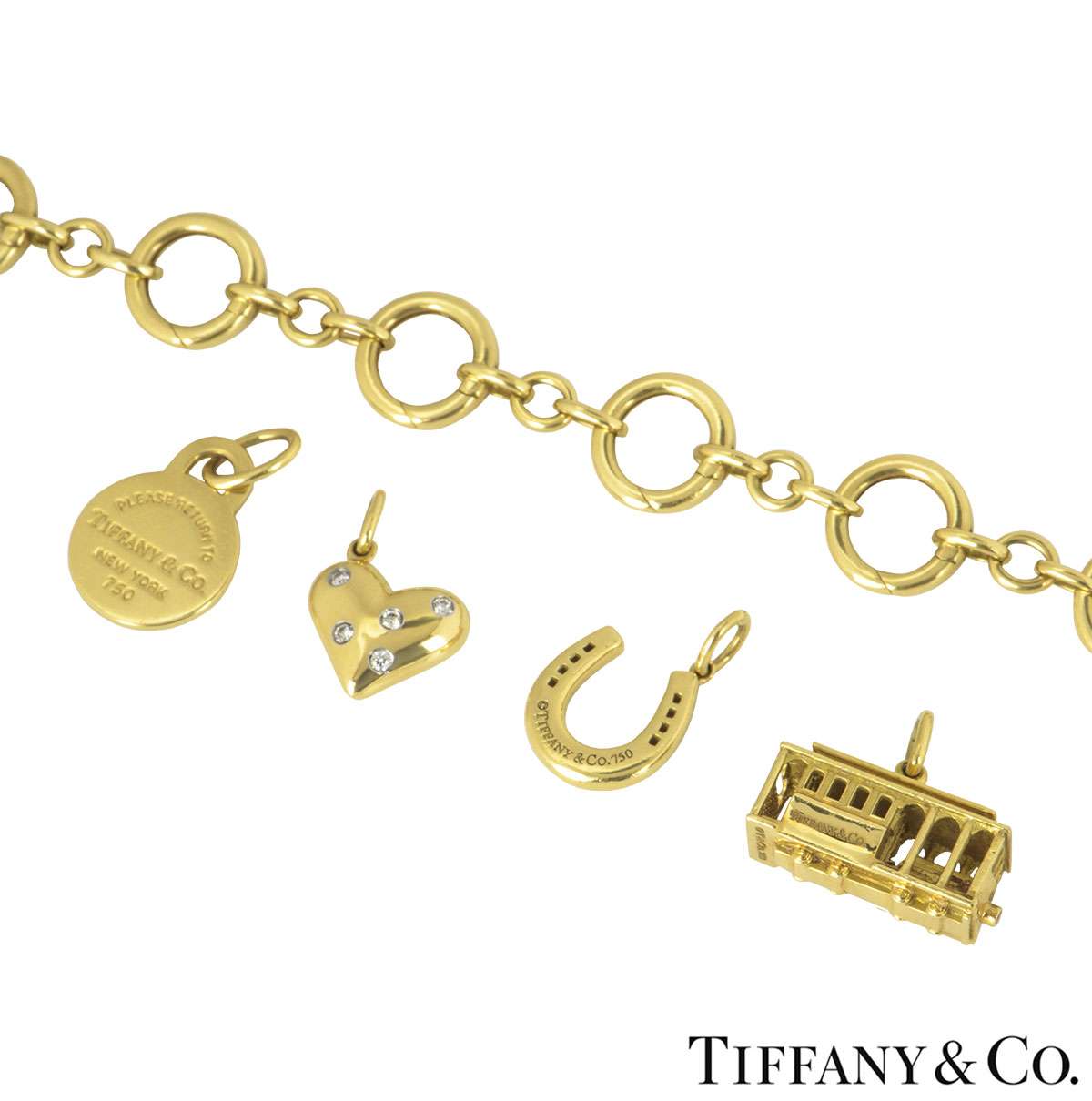 Tiffany & Co. Elsa Peretti Open Heart 18K Yellow Gold Charm Bracelet Tiffany  & Co. | TLC